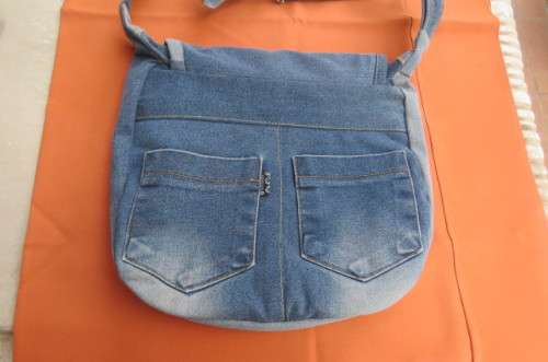 Hand blue denim bag with 3 zipped up departments. Made from used jeans size 30x30 cm.