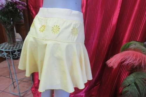 Chic and sexy buttercup, yellow mini skirt in 2 layers by `Woolworths` in size 32/8. As new!!