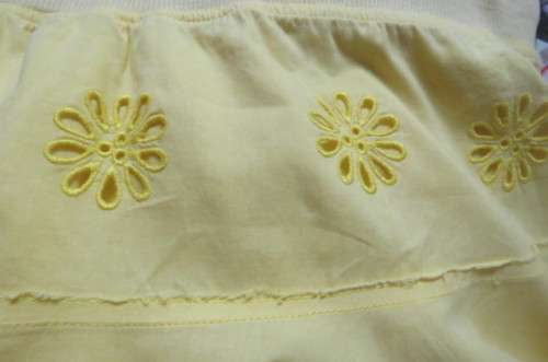 Chic and sexy buttercup, yellow mini skirt in 2 layers by `Woolworths` in size 32/8. As new!!
