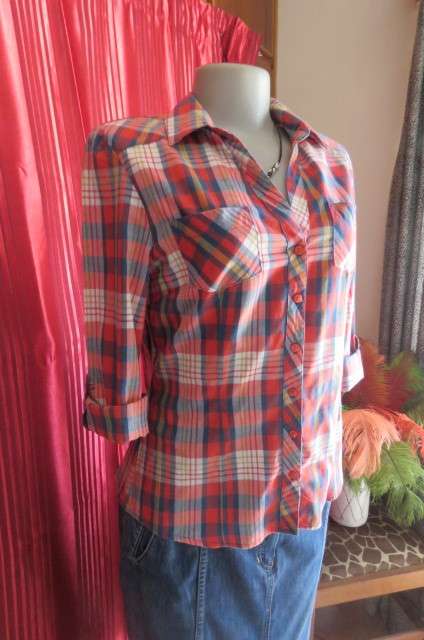 Casual long sleeve button down shirt by 'Love it' in size 42/18. V neckline and collar.