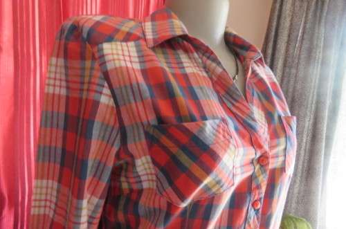 Casual long sleeve button down shirt by 'Love it' in size 42/18. V neckline and collar.