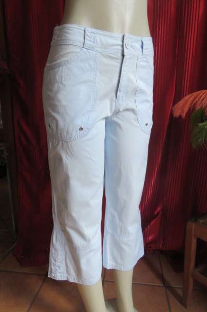 Casual cropped pants in light blue by `Woolworths` in size 32/8. Cargo front pockets.