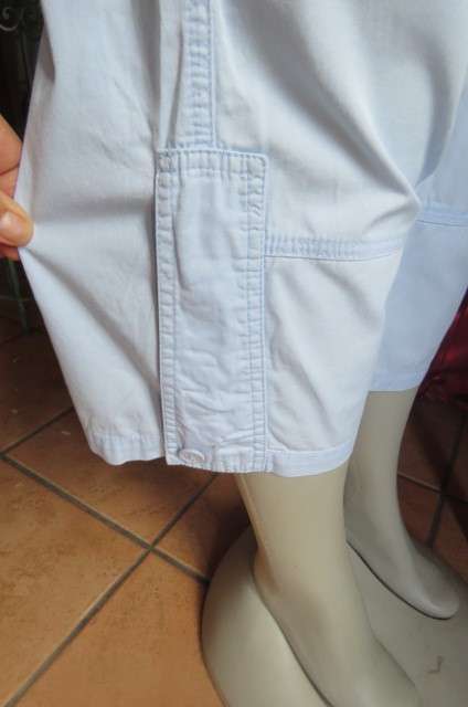 Casual cropped pants in light blue by `Woolworths` in size 32/8. Cargo front pockets.