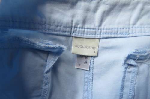 Casual cropped pants in light blue by `Woolworths` in size 32/8. Cargo front pockets.