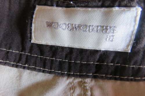 High quality beige ladies knee length shorts by`Woolworths`size 34/10. Low waist. In 100% cotton.