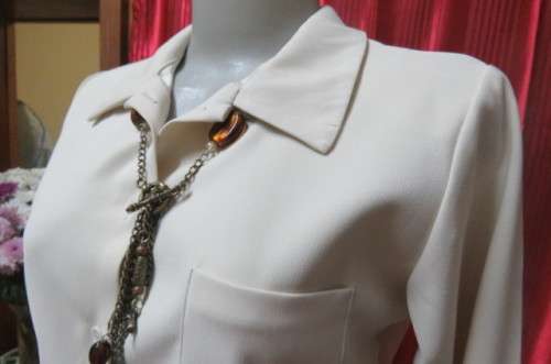 Smart cream top by `Jet-7` Paris. Tailored with 1 pocket on front size 34/10. Elbow length sleeves