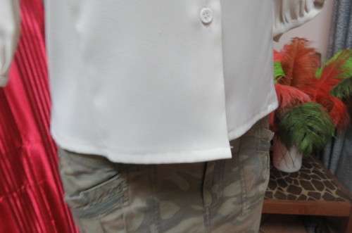Smart cream top by `Jet-7` Paris. Tailored with 1 pocket on front size 34/10. Elbow length sleeves