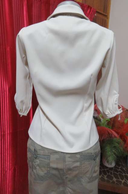 Smart cream top by `Jet-7` Paris. Tailored with 1 pocket on front size 34/10. Elbow length sleeves