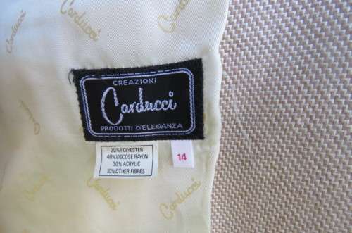 Best Quality 2 piece 'Carducci' skirt suit in size 37/13. Fully lined. With original belt.