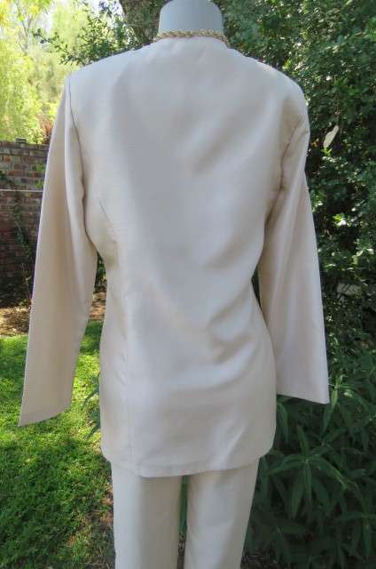 Amazing 2 piece pant suit by 'Esseence' in pear colour size 34/10. High waist pants with skinny legs