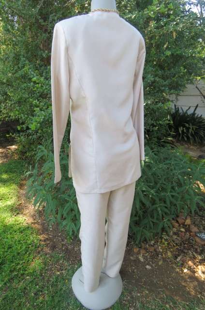 Amazing 2 piece pant suit by 'Esseence' in pear colour size 34/10. High waist pants with skinny legs