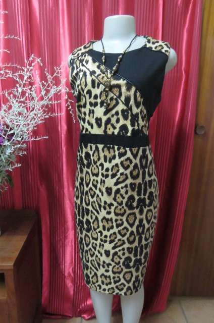 Pretty black and caramel colour animal print sleeveless shift dress size 42/18. Zip at back.