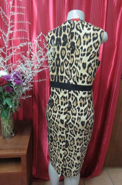 Pretty black and caramel colour animal print sleeveless shift dress size 42/18. Zip at back.