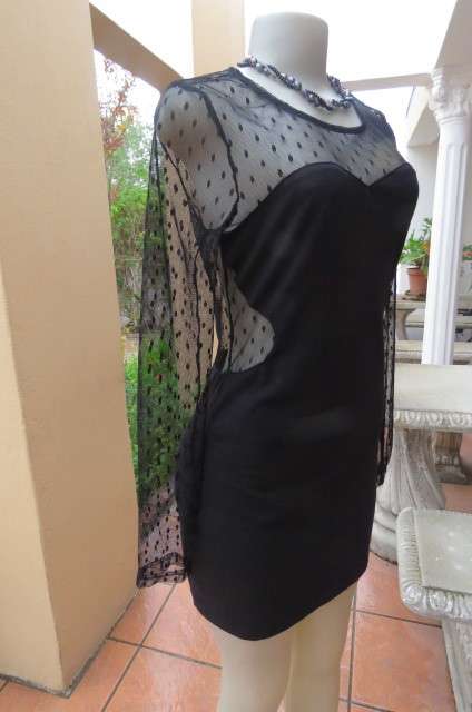 That little black dress! By 'Miss L' in size 38/14 fit size 36/12 good tight fit. Round neckline.
