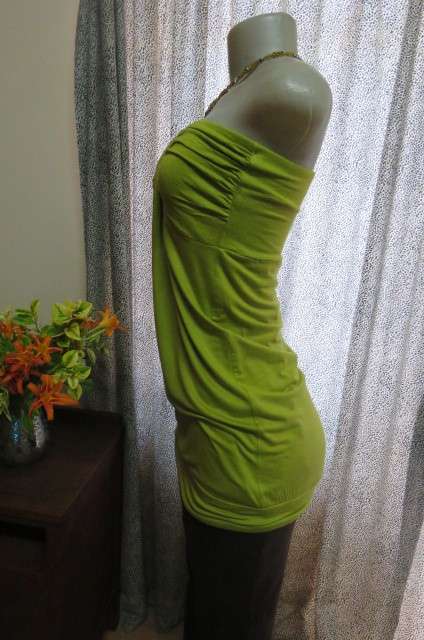 Strapless bright avogreen long top by `Woolworths` in size 34/10. Band over hips. In stretch cotton.