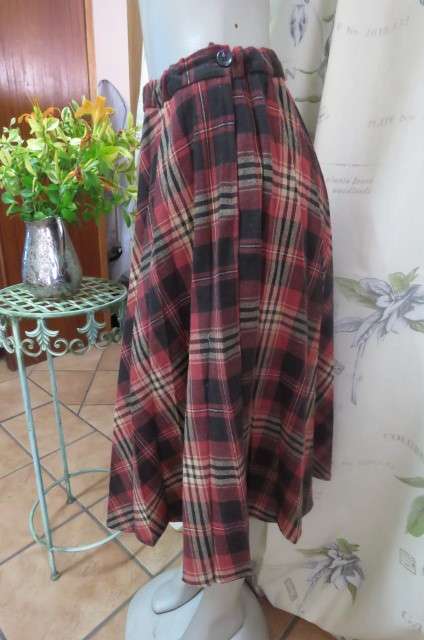 Tartan check vintage skirt with permanent pleats. Elasticated waist size 34/10.