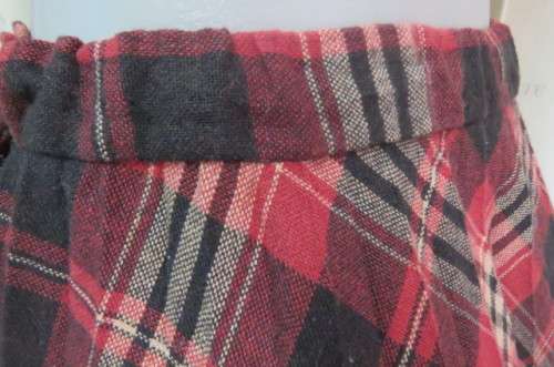 Tartan check vintage skirt with permanent pleats. Elasticated waist size 34/10.