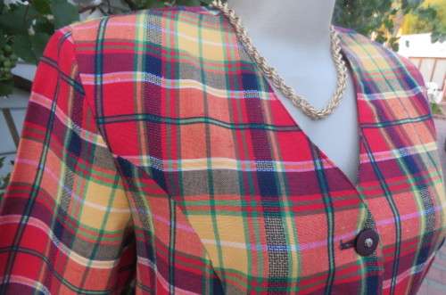 Smart but funky tartan check collarless short sleeve jacket by 'Tej' in size 36/12.