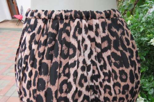 Beautifull pleated animal printed length skirt knife pleated size 38 to 40. 100% polyester fabric.