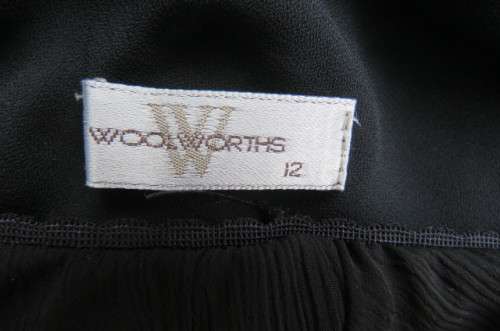 You can pair this smart black A-line skirt in 2 layers with a range of matching tops size 36/12.