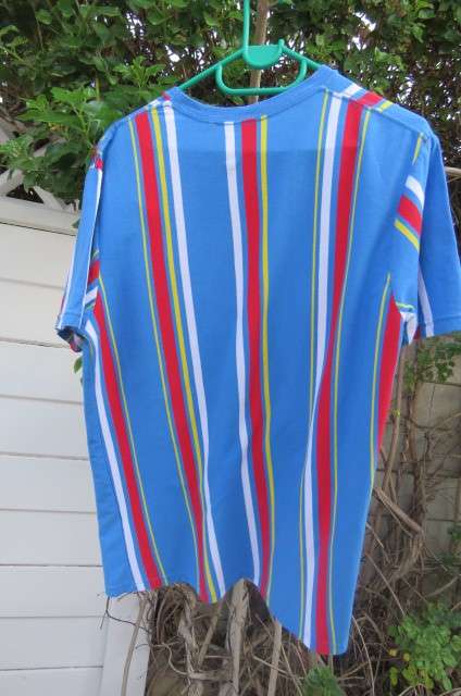 Fashion striped round neck short sleeve T-shirt in skyblue, white, red and yellow size Medium.