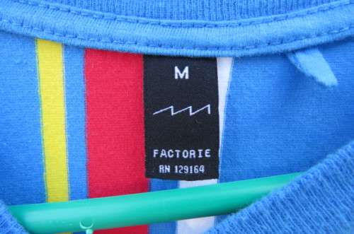 Fashion striped round neck short sleeve T-shirt in skyblue, white, red and yellow size Medium.