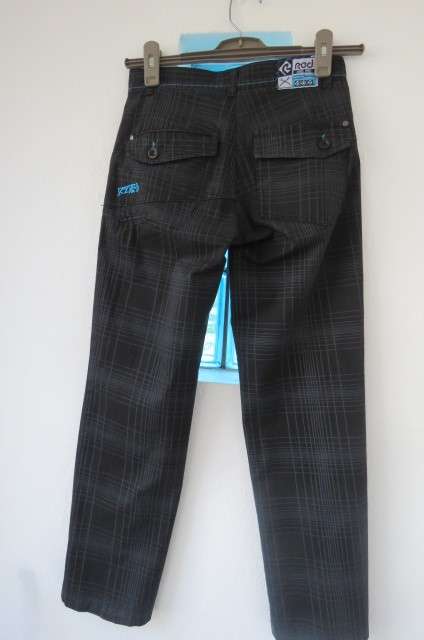 Black and grey check pants by `Red` for boy of 11 to 12 years old. Pockets back and front.