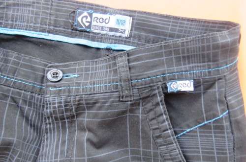 Black and grey check pants by `Red` for boy of 11 to 12 years old. Pockets back and front.