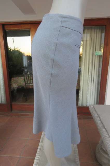 Sassy silvergrey paneled skirt. Only front waistband. Zip at back. By EXACT size 34/10.AS NEW