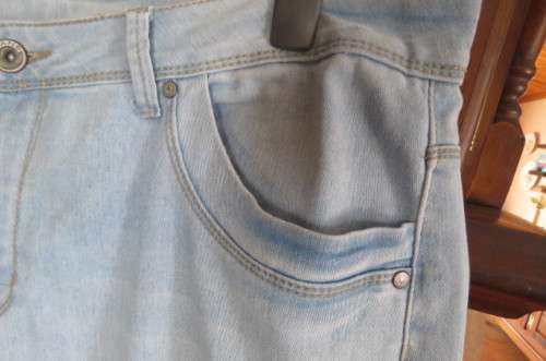 Modern ladies light blue denim jeans with distressed look by 'Donatella' size 46/22.