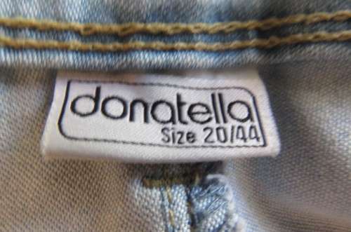 Modern ladies light blue denim jeans with distressed look by 'Donatella' size 46/22.