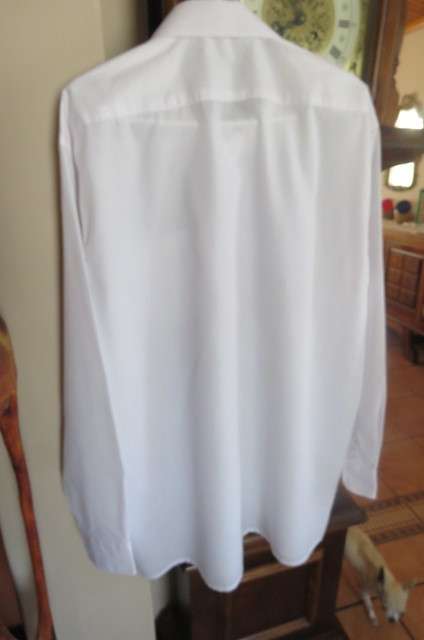White men's long sleeve shirt by 'Banned'. Front pocket size XL-chest 127 cm. In polycotton fabric.