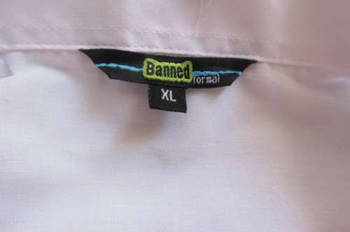 White men's long sleeve shirt by 'Banned'. Front pocket size XL-chest 127 cm. In polycotton fabric.