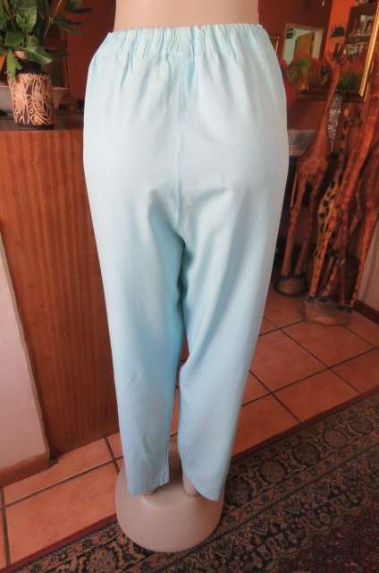 Comfy light blue pants in viscose and polyester blend by 'Bender Clothing' size 42 to 44.