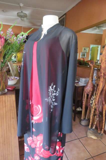 Amazing black sheer polyester long sleeve open top. High banded collar size 40/16 by 'Raoul'.