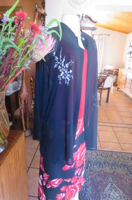 Amazing black sheer polyester long sleeve open top. High banded collar size 40/16 by 'Raoul'.