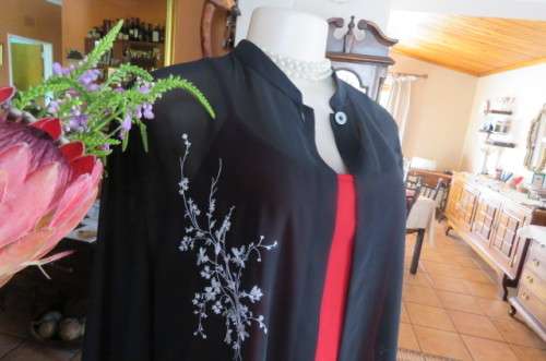 Amazing black sheer polyester long sleeve open top. High banded collar size 40/16 by 'Raoul'.