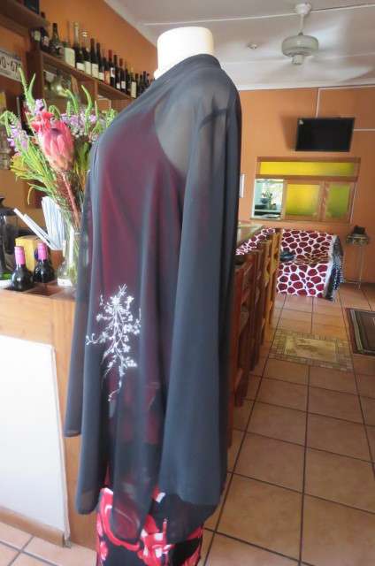 Amazing black sheer polyester long sleeve open top. High banded collar size 40/16 by 'Raoul'.