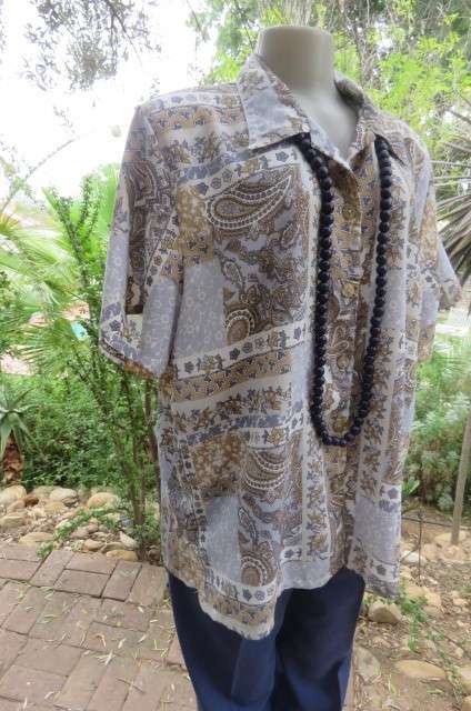 Paisley patterned soft blue, beige, grey and white button down top with open collar size 46/22.