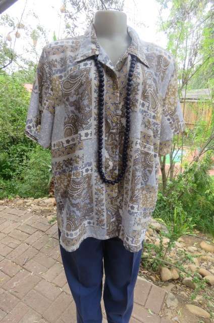 Paisley patterned soft blue, beige, grey and white button down top with open collar size 46/22.