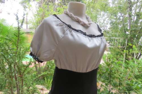 Lovely empire style top. Stretch polycotton bottom part in black size 36/12 by `Popular IU`.