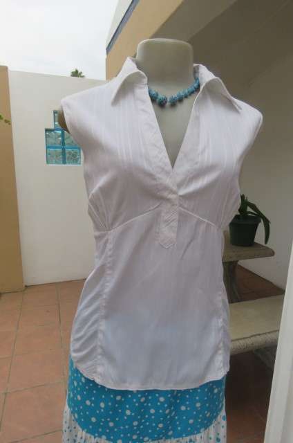 Cool white sleeveless top with front under bust gathering. Low banded V size 36/12 with collar.