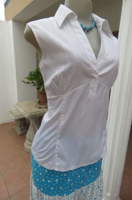 Cool white sleeveless top with front under bust gathering. Low banded V size 36/12 with collar.