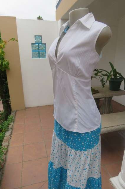 Cool white sleeveless top with front under bust gathering. Low banded V size 36/12 with collar.