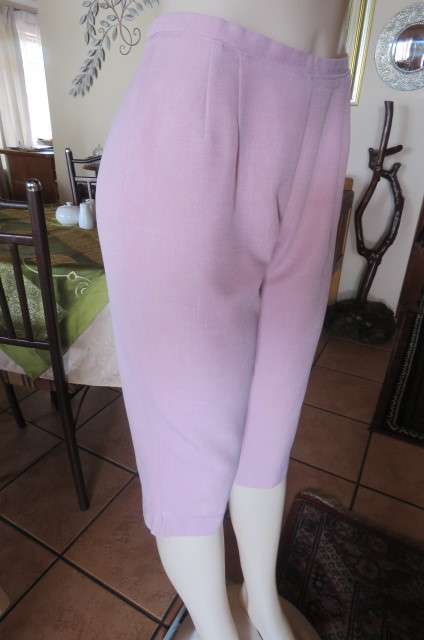 Stylish champagne pink capri pants with zip at side. Narrow waistband size 34/10. As new.