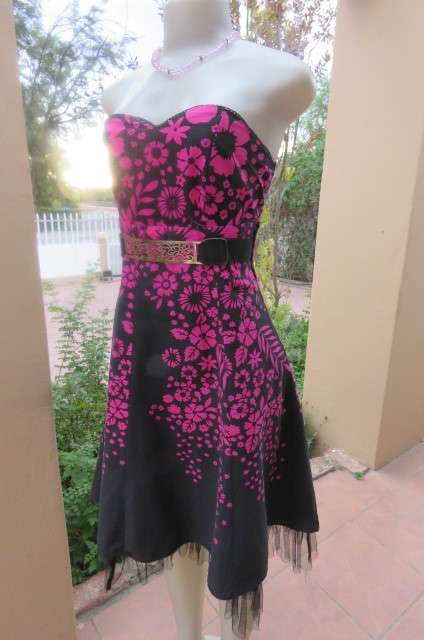 Sexy black strapless dress with magenta pink floral pattern. Size 34/10 by 'Insync Formal'.