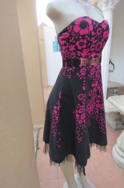 Sexy black strapless dress with magenta pink floral pattern. Size 34/10 by 'Insync Formal'.