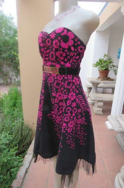 Sexy black strapless dress with magenta pink floral pattern. Size 34/10 by 'Insync Formal'.