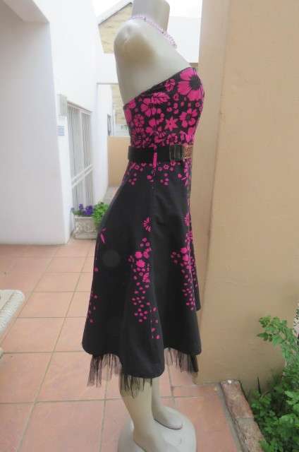 Sexy black strapless dress with magenta pink floral pattern. Size 34/10 by 'Insync Formal'.