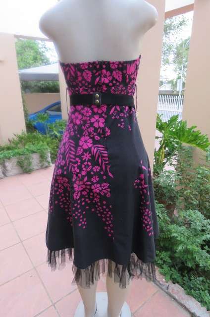 Sexy black strapless dress with magenta pink floral pattern. Size 34/10 by 'Insync Formal'.